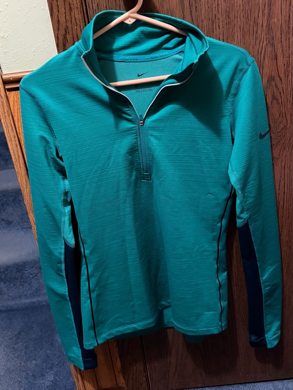 Nike Womenās Teal 1/4 Zip Sport Pullover